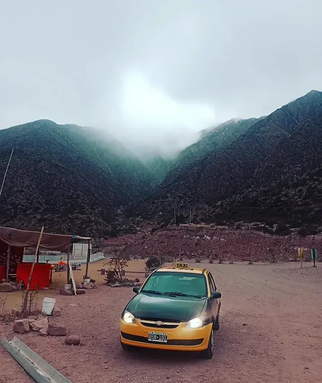 The Taxi Wine Chevrolet Classic with the Andes behind